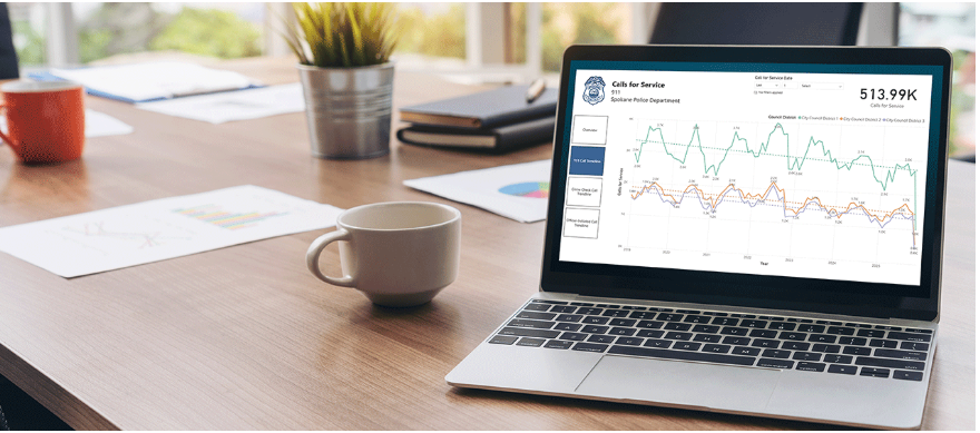 Photo of laptop with graph. 